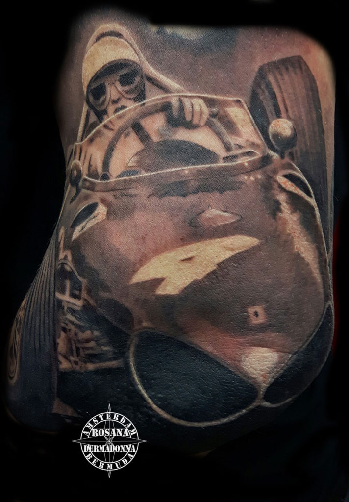 Ferrari Race Car Black And Grey Realism Tattoo done on Elbow